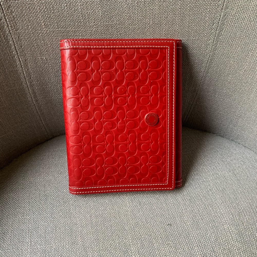 Classic red COACH leatherware photo album
